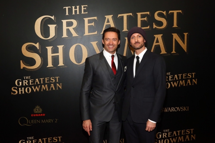 Hugh Jackman, left, and Michael Gracey attend as Cunard Hosts World Premiere of 20 th Century Fox’s “The Greatest Showman” on board Greatest Ocean Liner, Flagship Queen Mary 2, on Friday, Dec. 8, 2017, in Brooklyn, N.Y. This is the first ever major motion picture premier to take place on board a passenger ship. (Photo by Stuart Ramson/Invision for Cunard/AP Images)